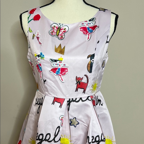 Whimsical Pink Midi Dress with Playful Prints - Picture 4 of 16